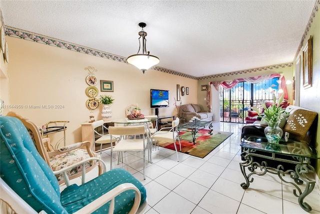 dining area featuring a textured ceiling and light tile patterned floors