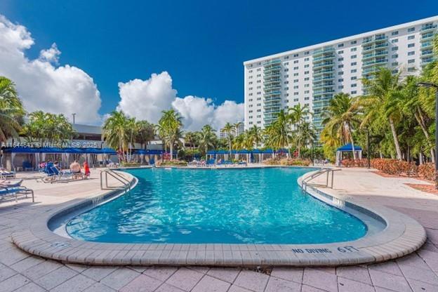 community pool featuring a patio