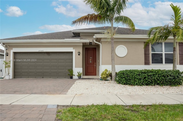 view of front of property with a garage