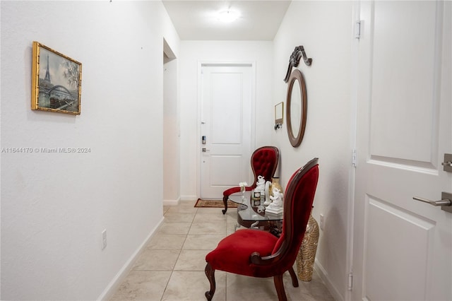 hall with light tile patterned flooring