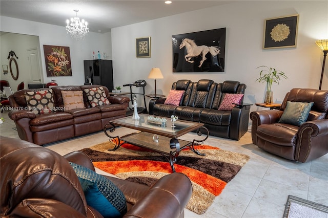 living room featuring light tile patterned flooring and an inviting chandelier