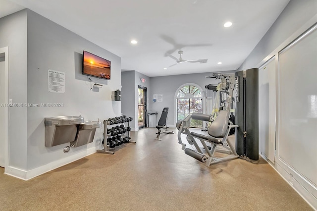 workout room featuring baseboards, ceiling fan, and recessed lighting