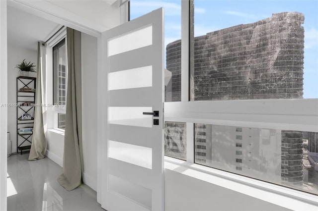 interior space featuring baseboards