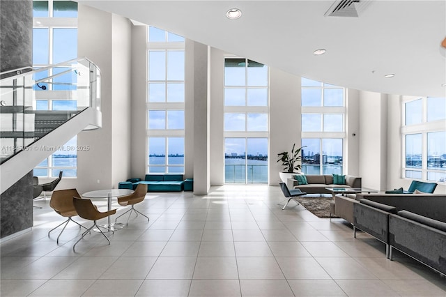 lobby with visible vents and a water view