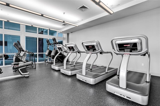 gym featuring visible vents