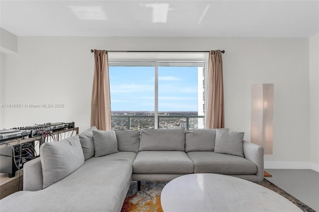 living room featuring baseboards