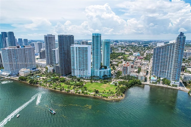 aerial view with a city view and a water view