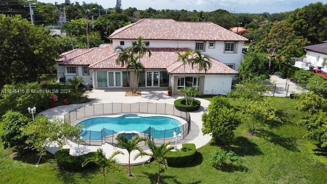 rear view of property with a patio area