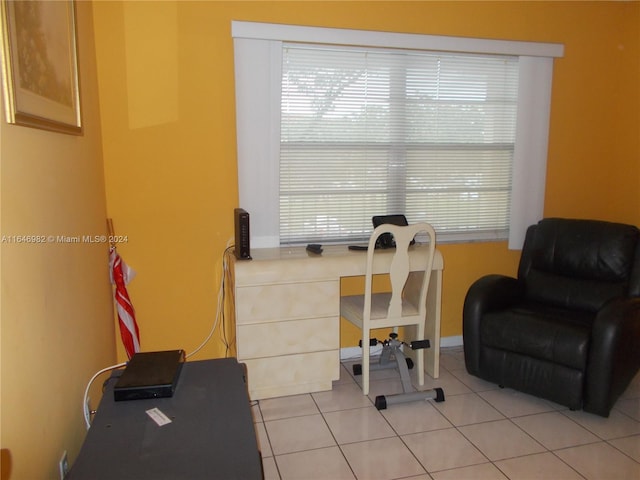 office space with light tile patterned floors