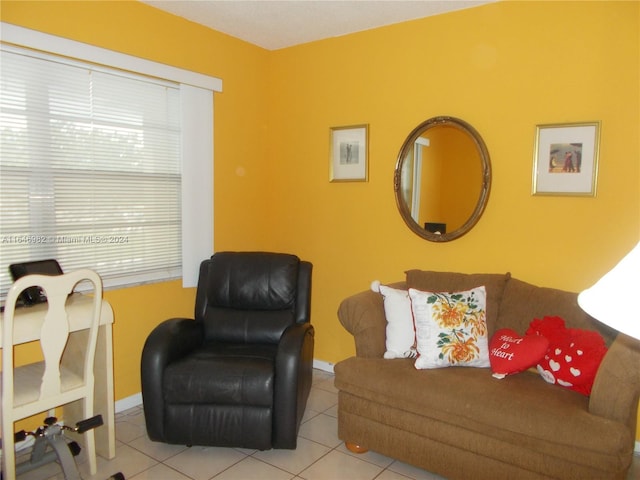 living room with light tile patterned flooring