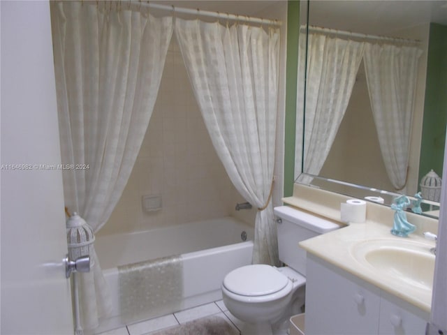 full bathroom featuring shower / bath combination with curtain, toilet, tile patterned floors, and vanity