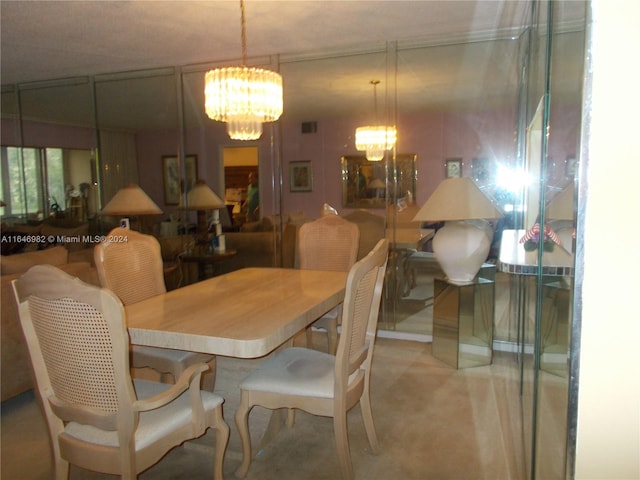 dining room with a chandelier