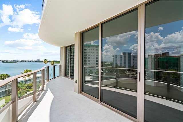 balcony featuring a water view