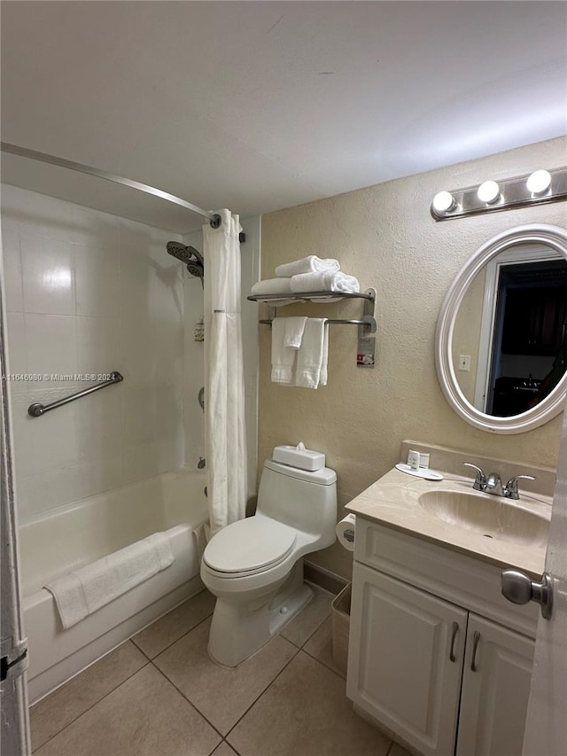 full bathroom with shower / bath combo, toilet, tile patterned floors, and vanity