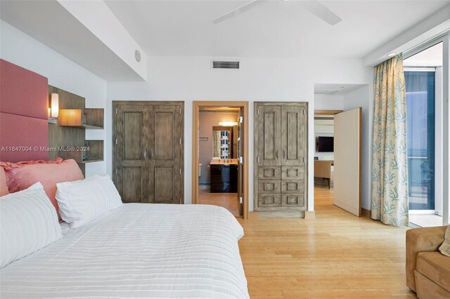 bedroom featuring ceiling fan and light wood-type flooring