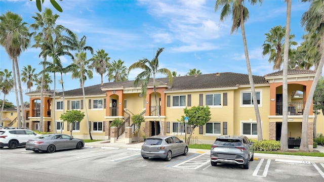3395 NE 9th St Unit 101, Homestead, FL 33033 - view of building exterior featuring uncovered parking
