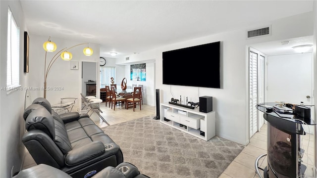 living room featuring light tile patterned floors