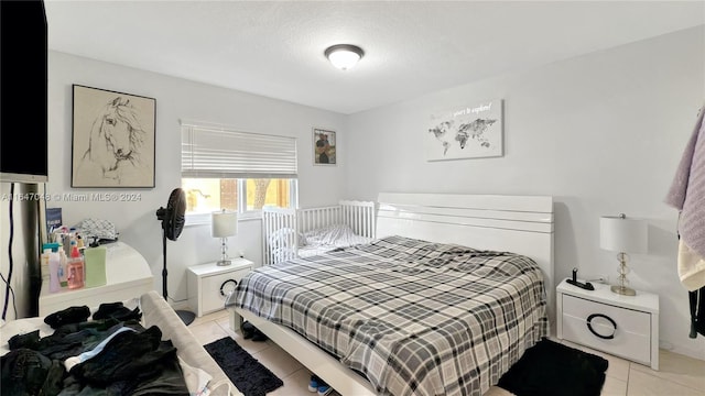 3395 NE 9th St Unit 101, Homestead, FL 33033 - bedroom featuring light tile patterned flooring