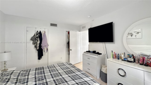 3395 NE 9th St Unit 101, Homestead, FL 33033 - bedroom featuring light tile patterned floors