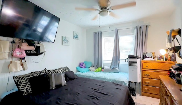 3395 NE 9th St Unit 101, Homestead, FL 33033 - bedroom featuring light tile patterned floors and ceiling fan
