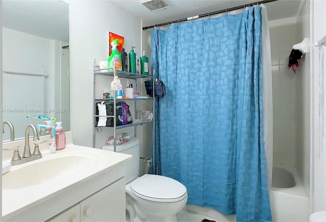 3395 NE 9th St Unit 101, Homestead, FL 33033 - bathroom with toilet, tile patterned flooring, vanity, and shower / bath combo with shower curtain