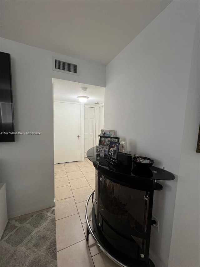 3395 NE 9th St Unit 101, Homestead, FL 33033 - corridor featuring light tile patterned floors