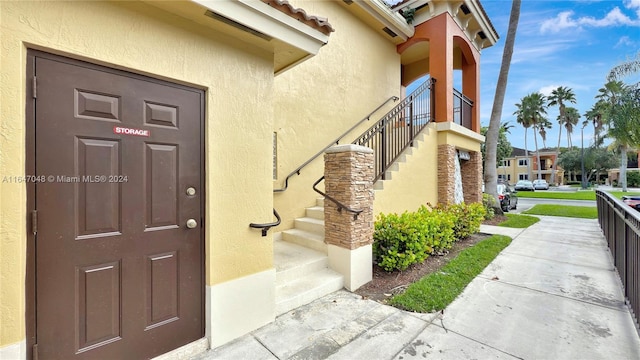 3395 NE 9th St Unit 101, Homestead, FL 33033 - view of exterior entry featuring stucco siding