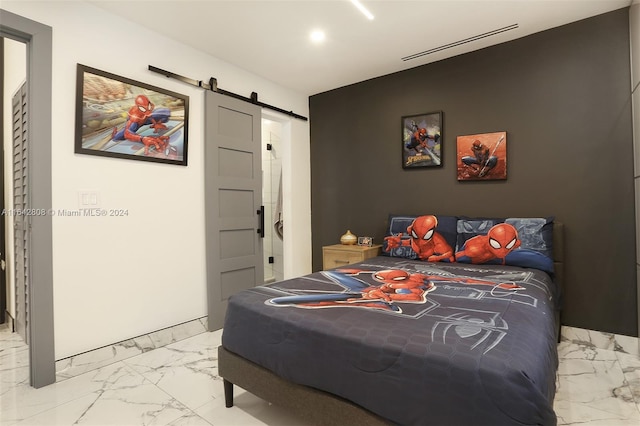 bedroom with a barn door