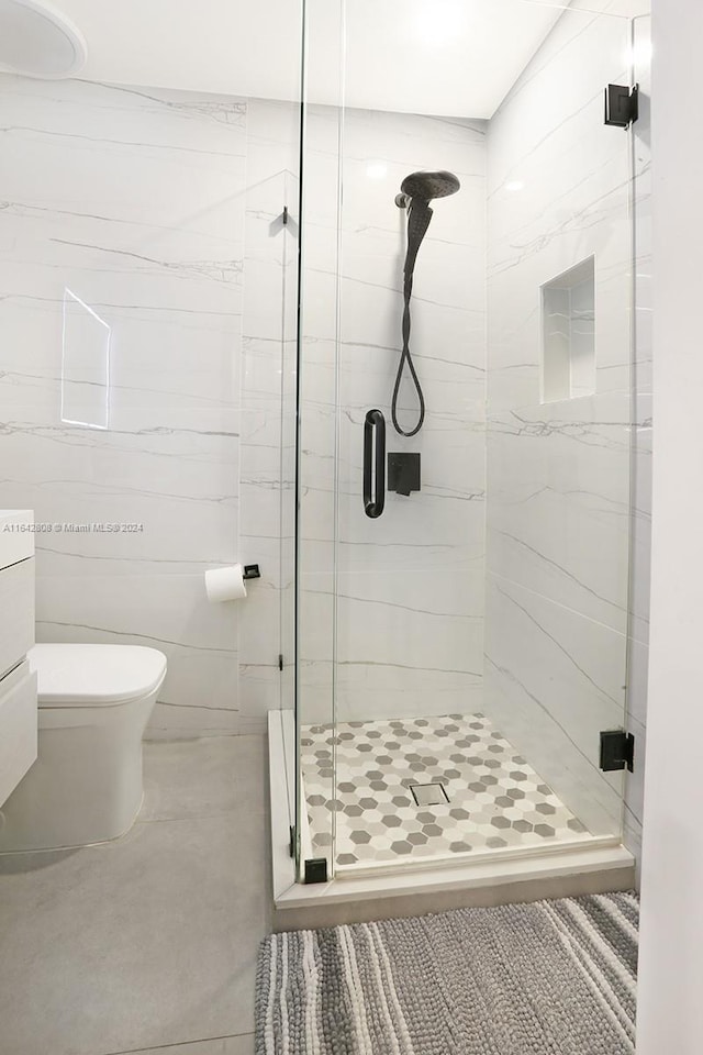 bathroom featuring vanity, toilet, and walk in shower