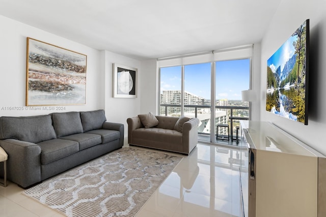 living area featuring a wall of windows and a city view