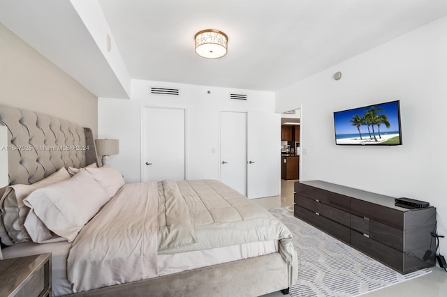 bedroom featuring visible vents