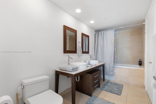 full bathroom with tile patterned flooring, toilet, recessed lighting, vanity, and tiled shower / bath