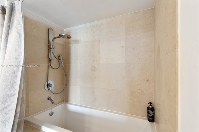 bathroom with shower / tub combination