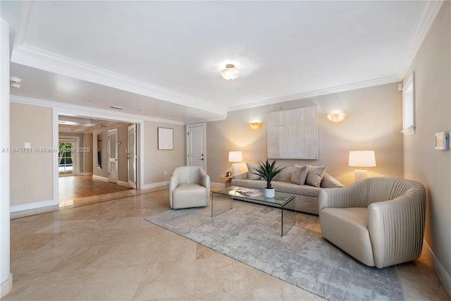 living room featuring crown molding