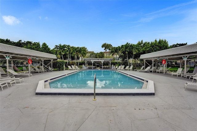 view of swimming pool featuring a patio area and a gazebo