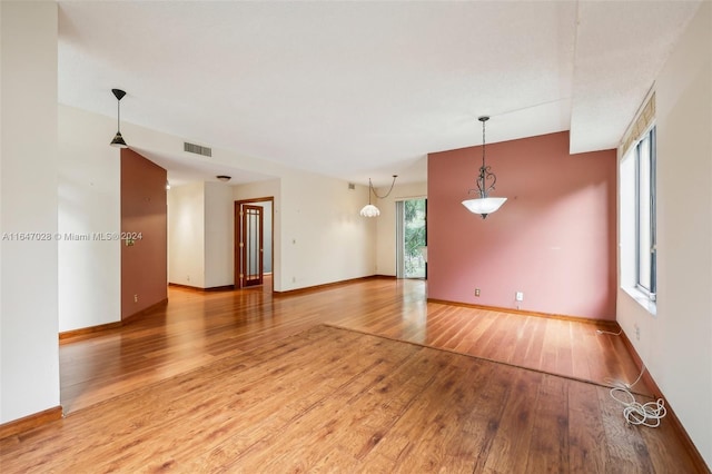 empty room featuring hardwood / wood-style flooring