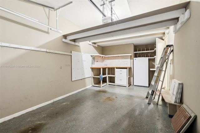 garage with white fridge