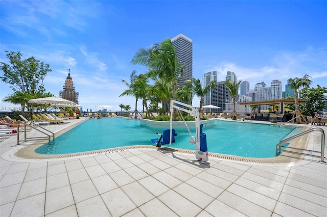 view of swimming pool featuring a patio