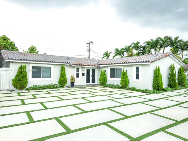 rear view of house featuring a patio