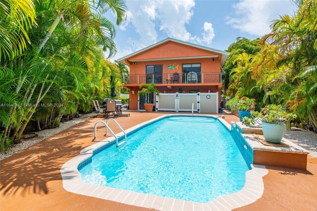 view of pool featuring a patio area