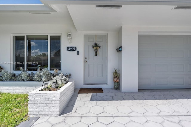 entrance to property with a garage