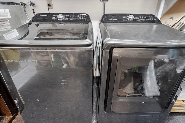 laundry room featuring separate washer and dryer