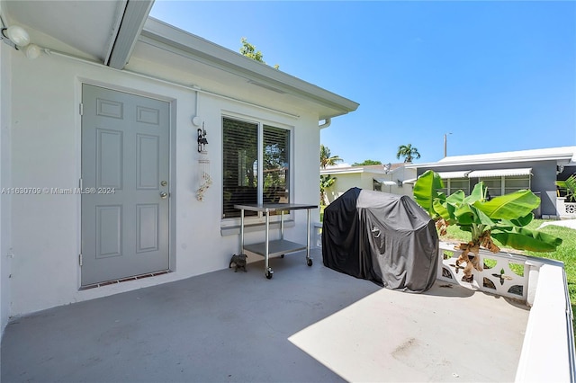 doorway to property featuring a patio area