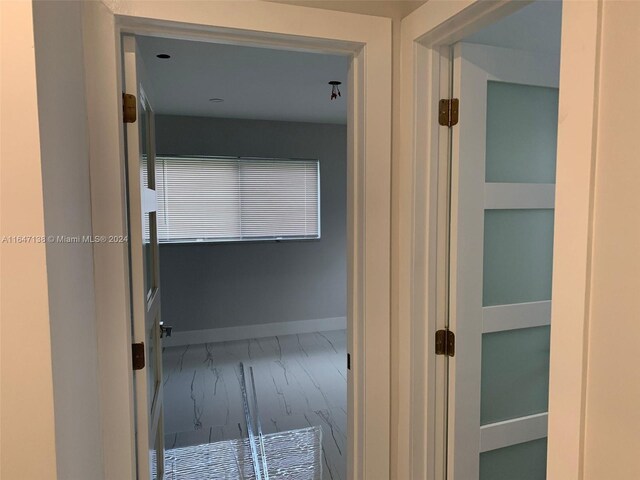 4741 NE 19th Ave, Fort Lauderdale, FL 33308 - hallway with baseboards