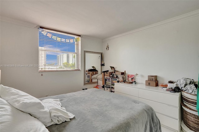 bedroom featuring crown molding