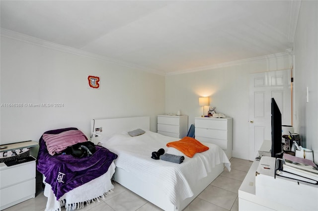 tiled bedroom with ornamental molding