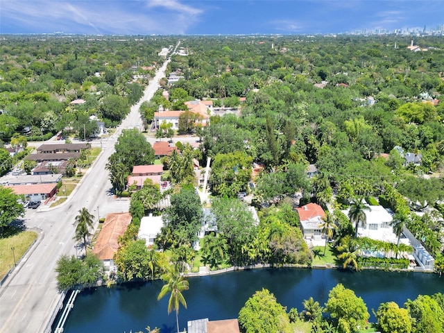 drone / aerial view with a residential view and a water view