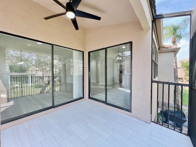 view of patio with ceiling fan