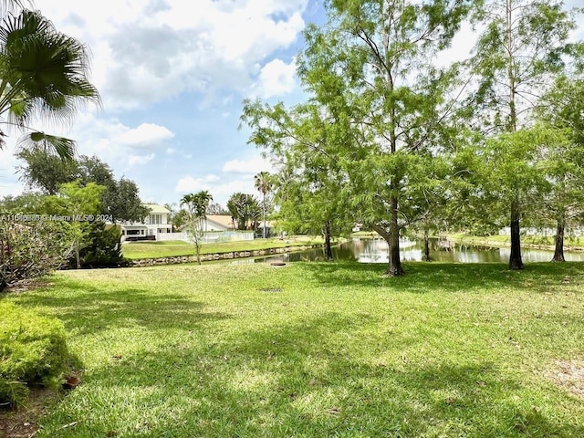 view of yard with a water view