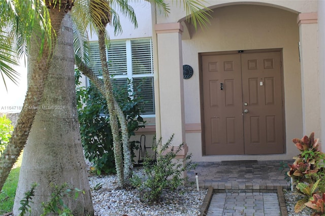 mediterranean / spanish-style home featuring a garage